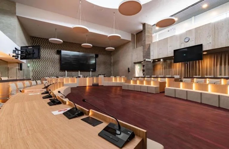 Council chamber with a conference system and delegate microphones