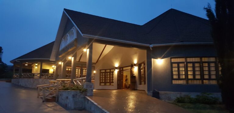 Emburara Farm Lodge lit up at night