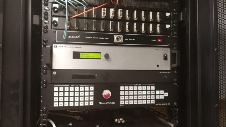 Equipment rack with interpretation system and video matrix