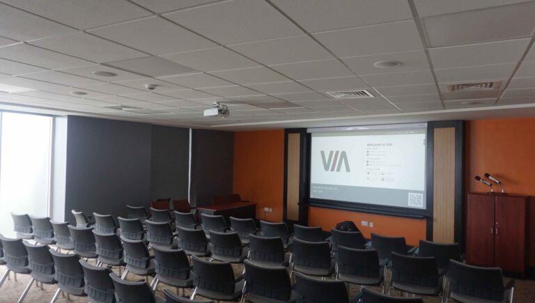 Meeting room with projector and lectern microphones