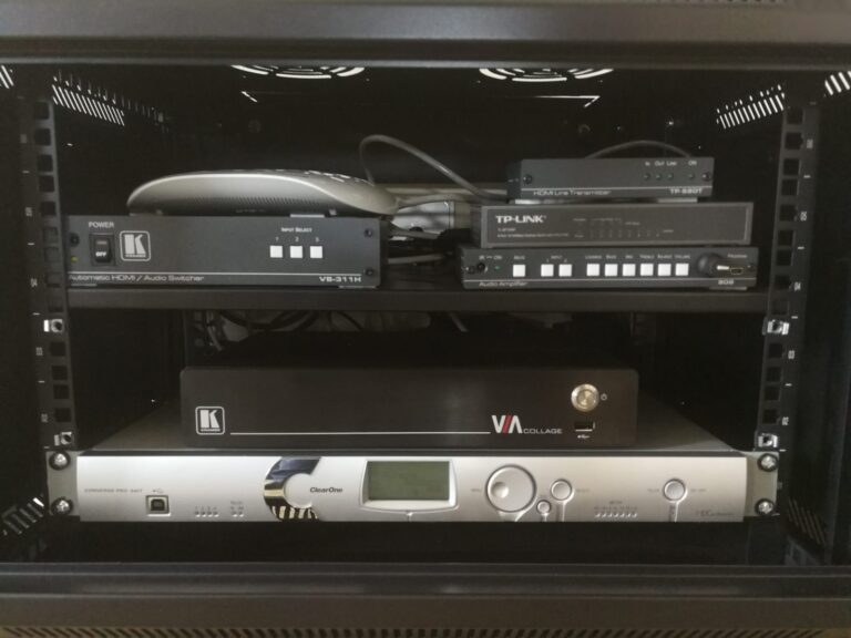 Meeting room rack with switcher, amplifier, wireless presentation and audio processor