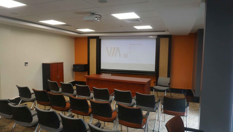 Training room with projector, screen and wireless presentation