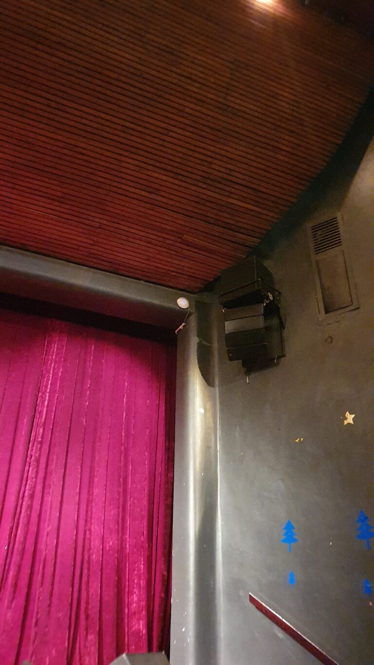 TOA HX-7 line array speaker beside the proscenium