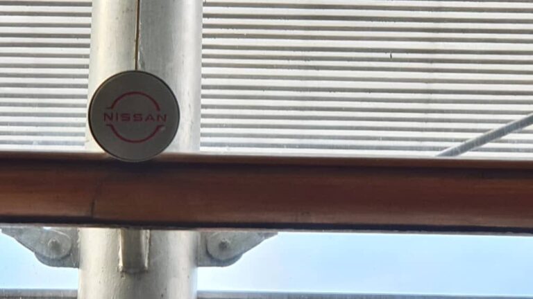 Front view of a Nissan-branded speaker grille