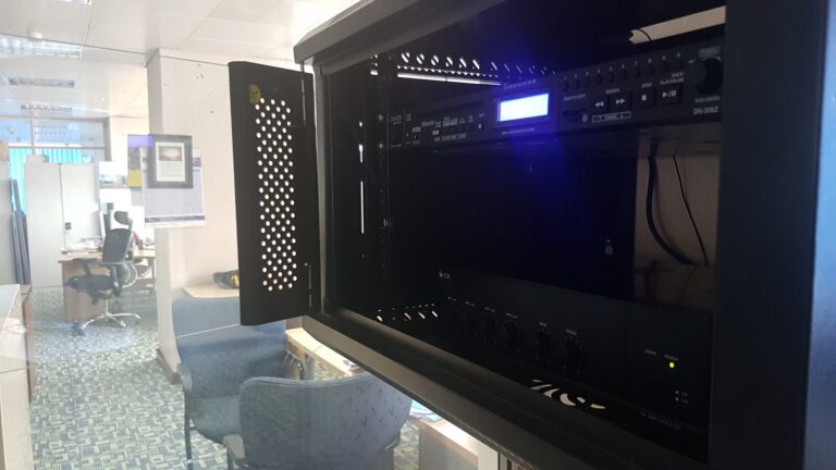 Wall cabinet with Denon DN-300Z media player and TOA mixer amplifier