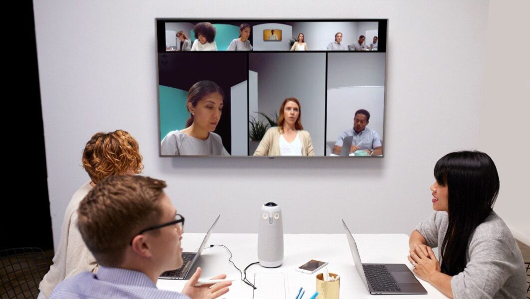 Owl Labs 360 degree meeting camera on the table of a hybrid meeting room