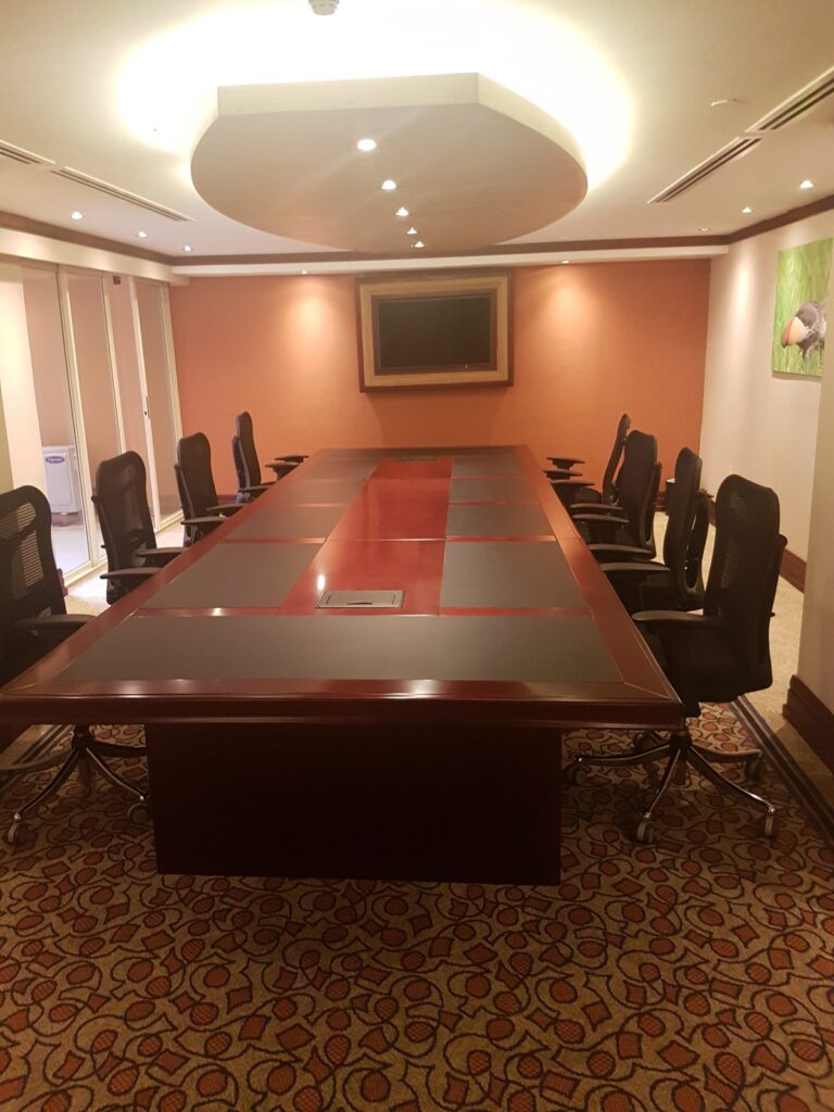 Kampala Serena Hotel boardroom with framed display