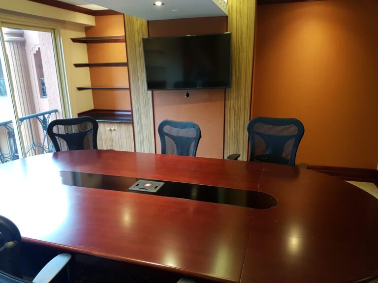 Kampala Serena Hotel meeting room with wall display and table connection box