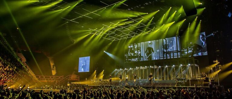 Moving head stage lighting over a concert stage