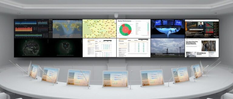 Video wall above a curved operator desk in a control room