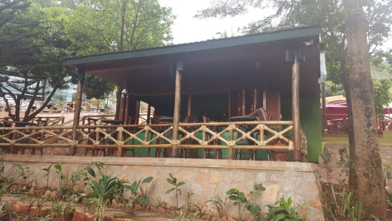 Garden bar with weatherproof speakers under the roof