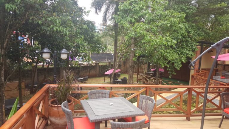 Terrace and garden seating at The Lawns, Kololo