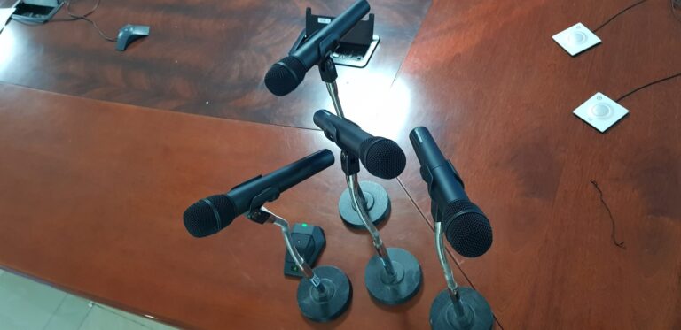 Audio-Technica wireless microphones on table stands with boundary microphone